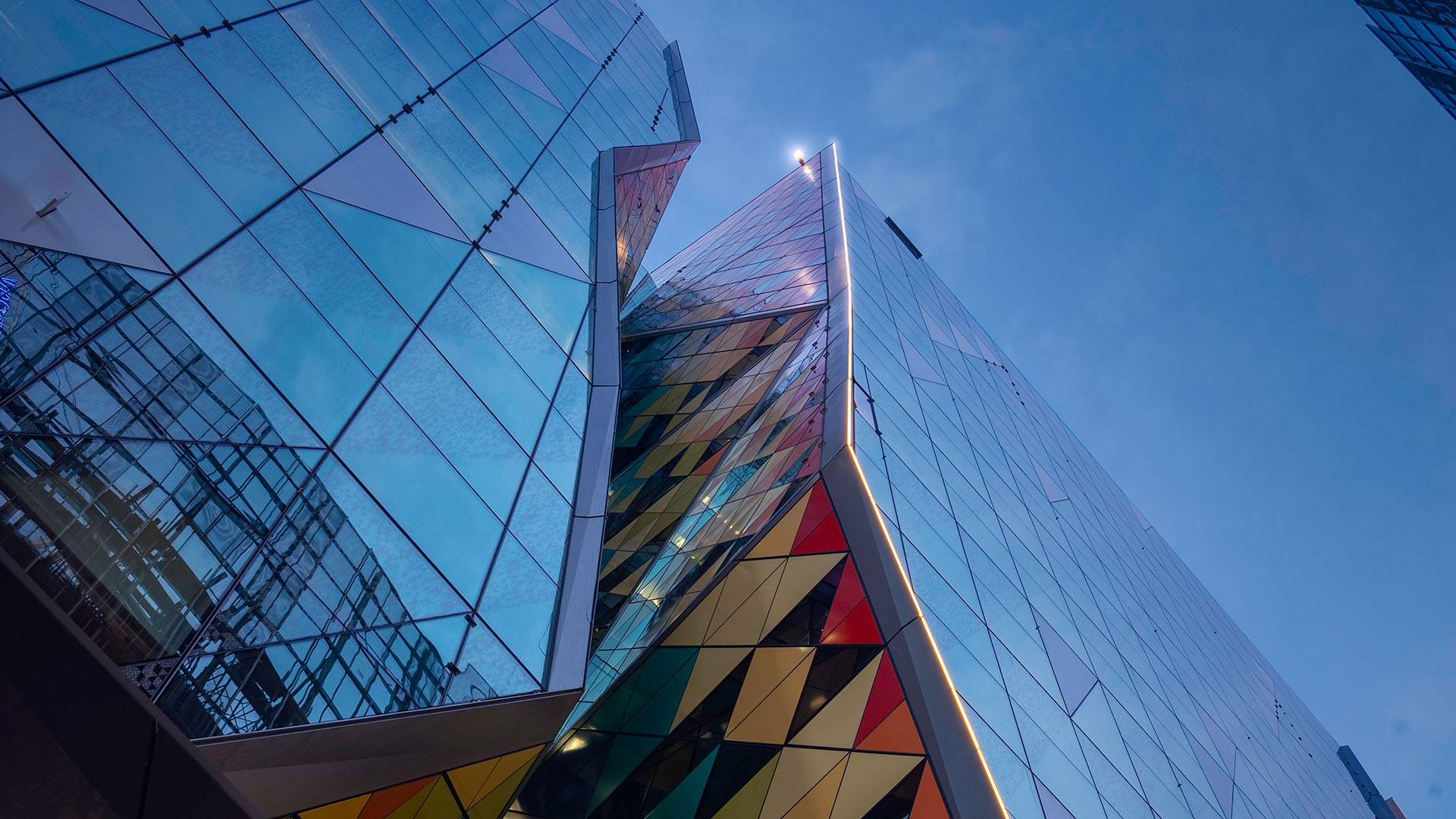 LED strip façade illumination made possible using Multo IP66 LED strip. The appearance of a continuous line of light is achieved using multiple rigid lengths.