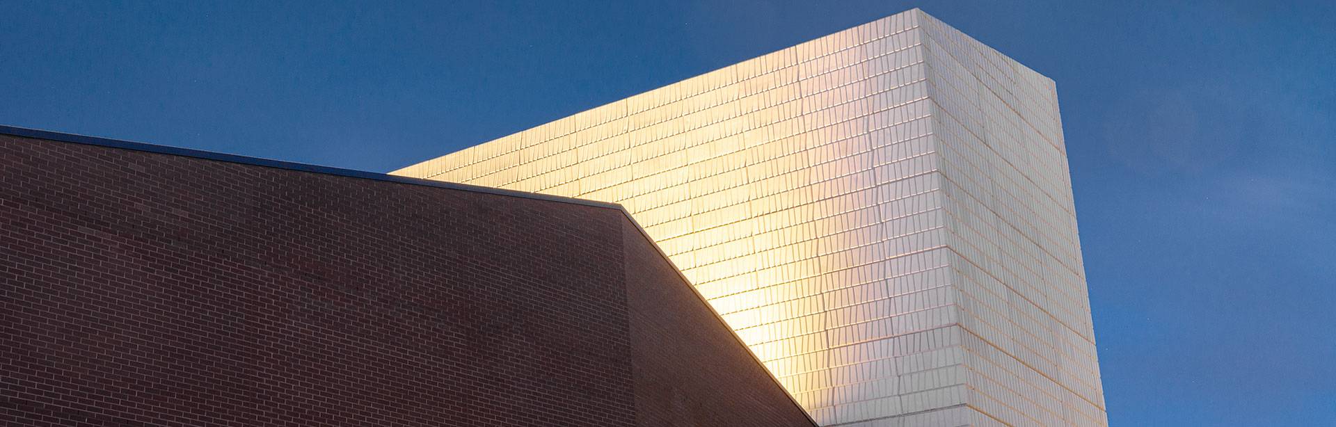 Maxis high-power linear floodlight in application, installed on the facade of the Alexander Theatre.The luminaires feature custom designed baffles that mitigate any unnecessary spill light.