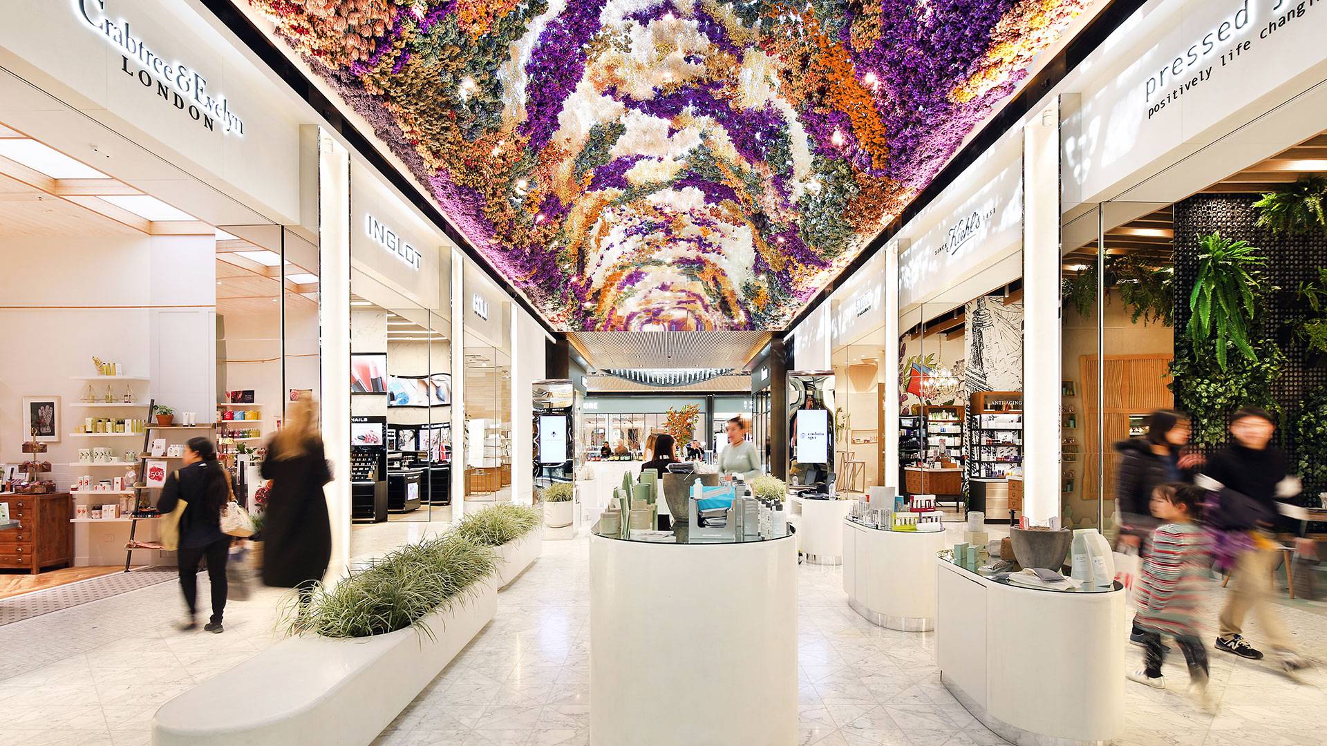 Coolon Aris Linear Strip, complete with oval optics, grazes the feature ceiling of the Eastland Beauty Mall.