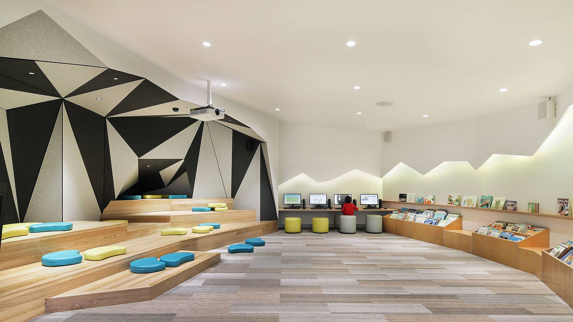 The colour changing Spectrum RGB strip illuminates a feature wall, creating an appealing and whimsical space.