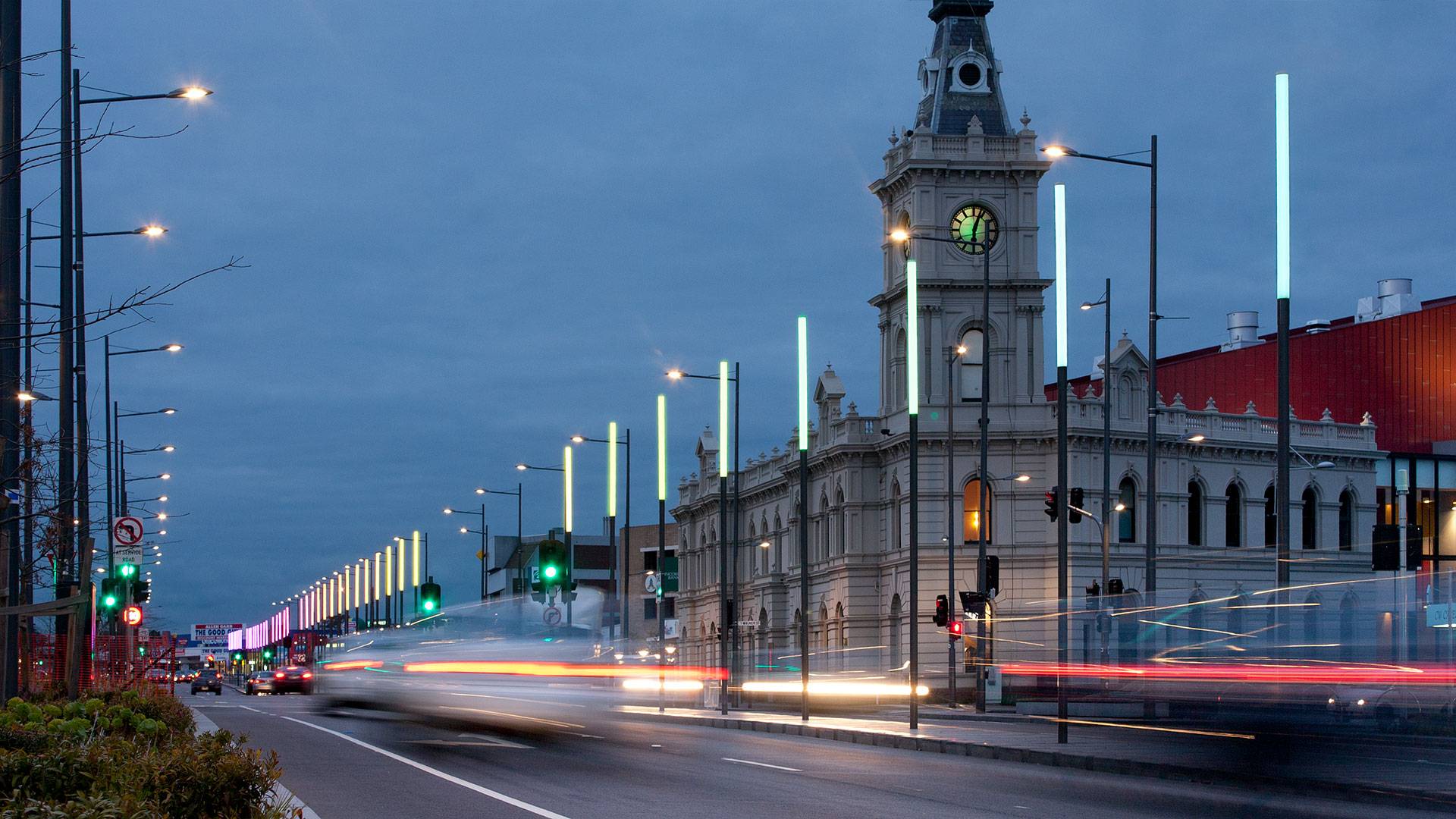 An installation of 68 illuminated colour changing poles lines the Lonsdale Street shopping precinct in Dandenong, Melbourne