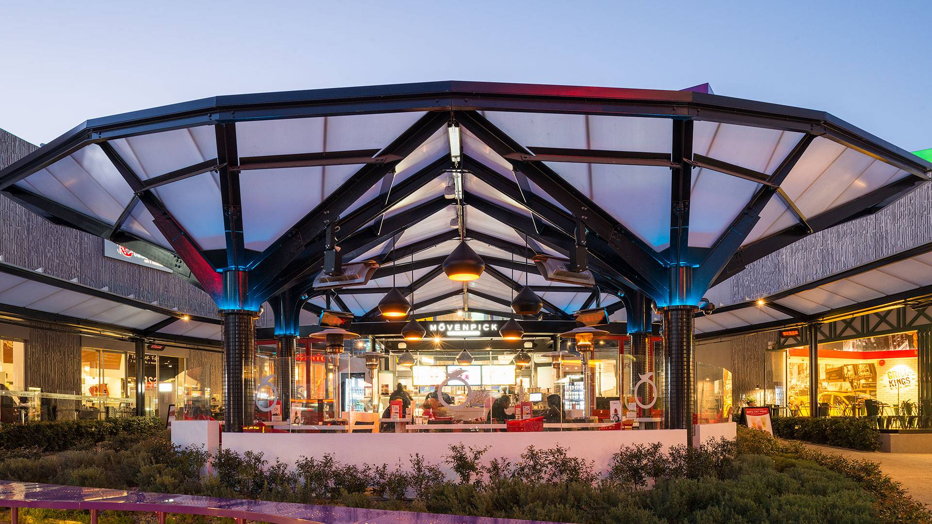 Small segments of Spectrum were all that was required to uplight the rooftop of this canopy. The segments can be tuned to different colours or programmed to run through a sequence to suit festive days or simply as an element of surprise for shoppers.