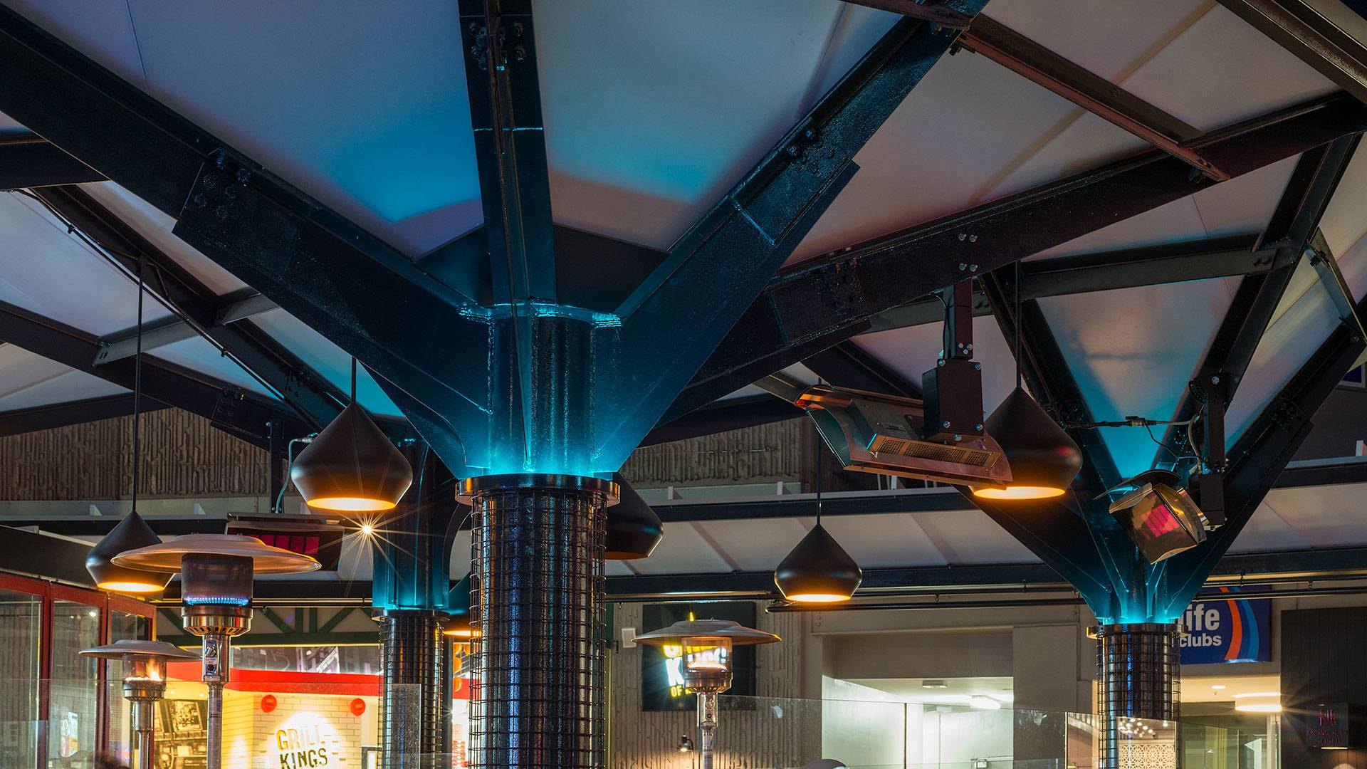 Small segments of Spectrum were all that was required to uplight the rooftop of this canopy. The segments can be tuned to different colours or programmed to run through a sequence to suit festive days or simply as an element of surprise for shoppers.