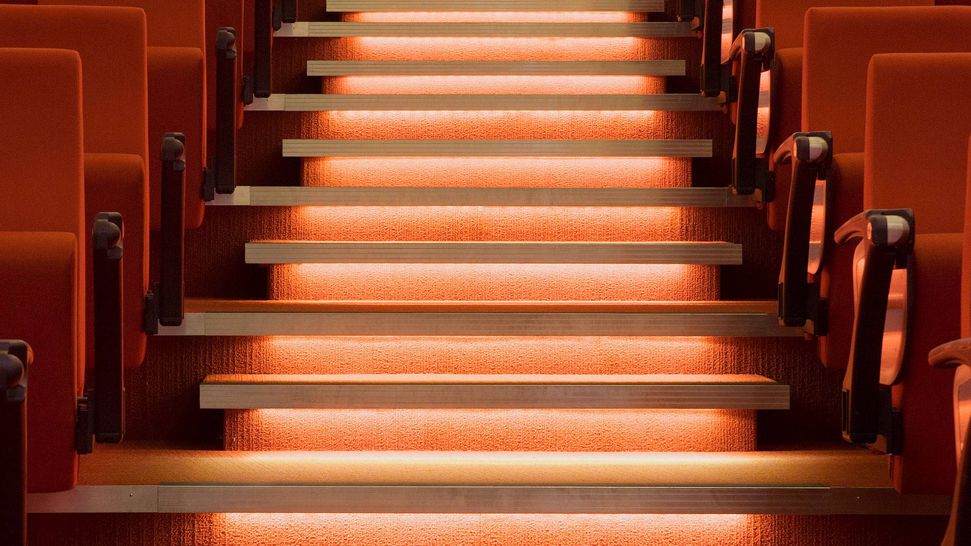 Primo X2 LED strip in application, installed in the Swinburne University AMC Building Lecture Theatre. Multiple soffits create a wave-like effect and double as an indirect lighting source.
