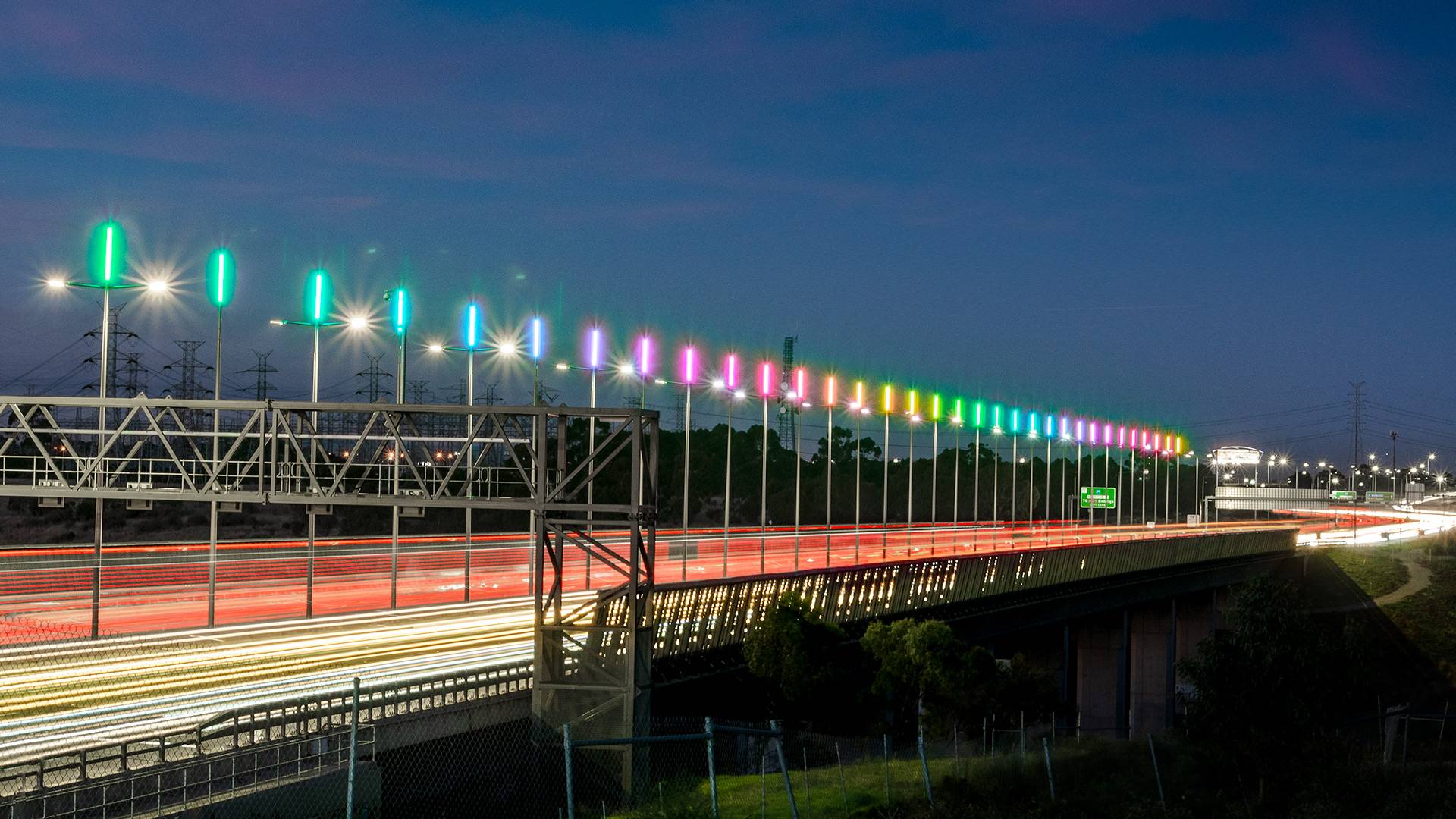 A rainbow-inspired intricate fusion of LED technology and modern art turned the Whitten Bridge into a unique local landmark.