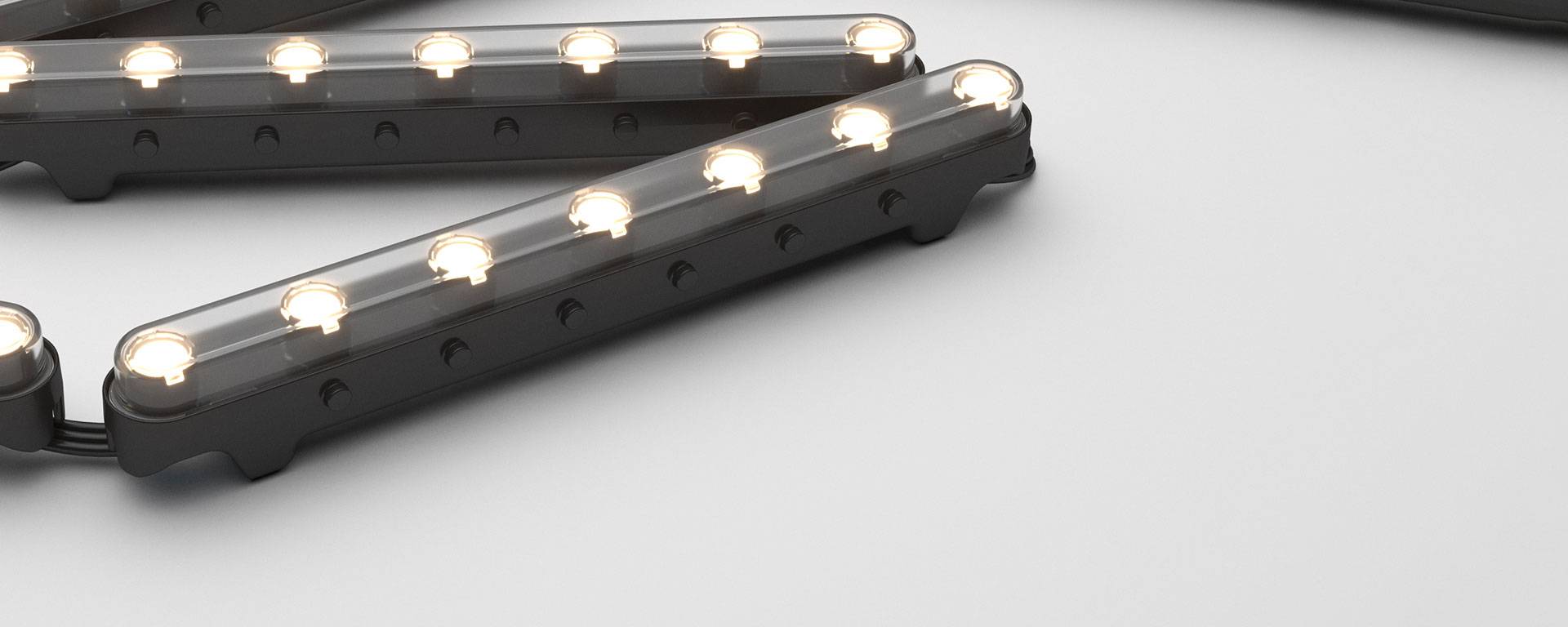 Aduro CL is a modular chain LED fitting that has a flexible connection between each segment, enabling use along curved surfaces to create wall washing and grazing effects, while retaining efficacy and durability of rigid technology.