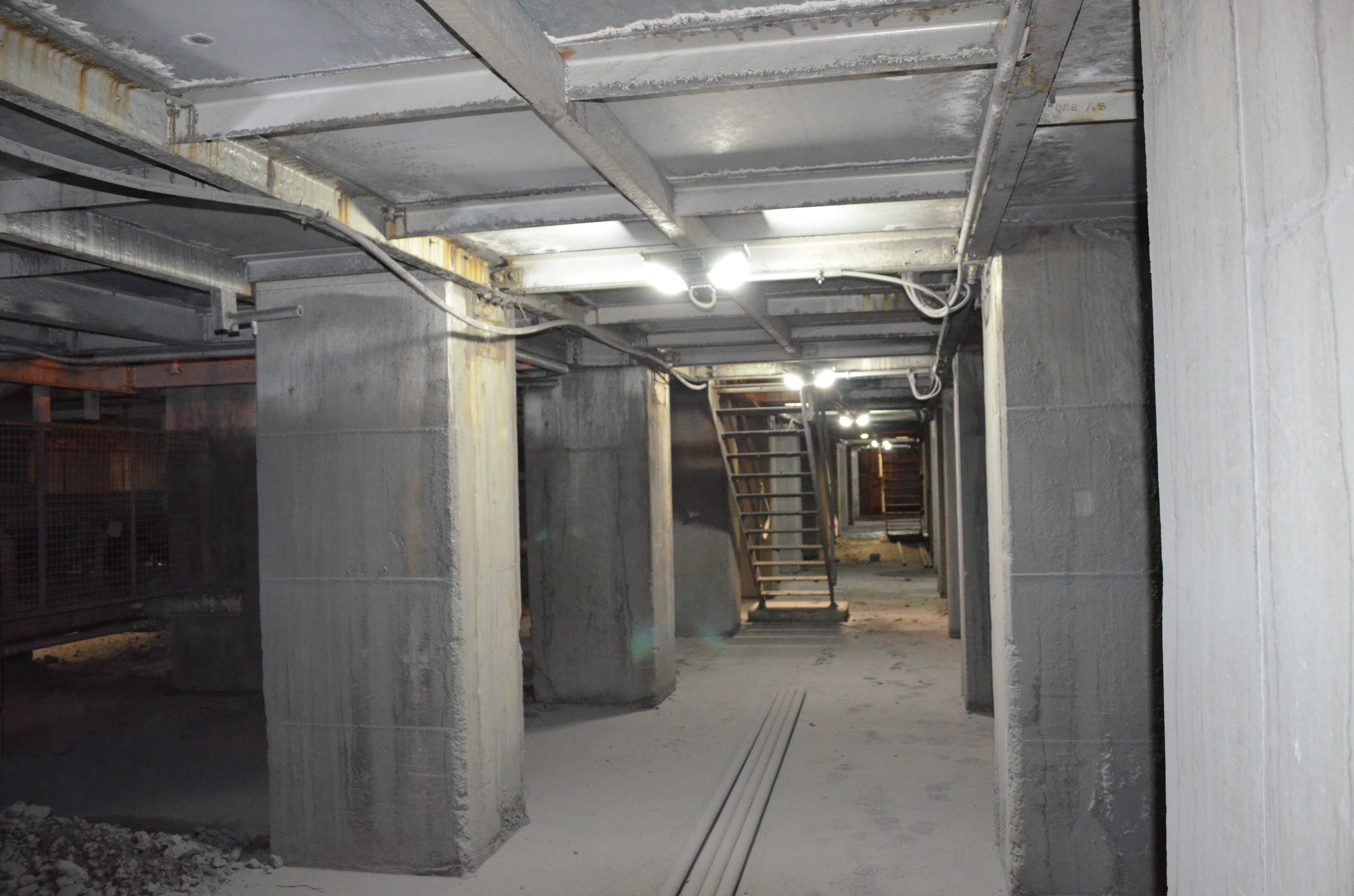 Coolon Tunnel Ray LED industrial lighting installed on a copper mine in northern queensland. View on a corridor with high illuminance levels. 