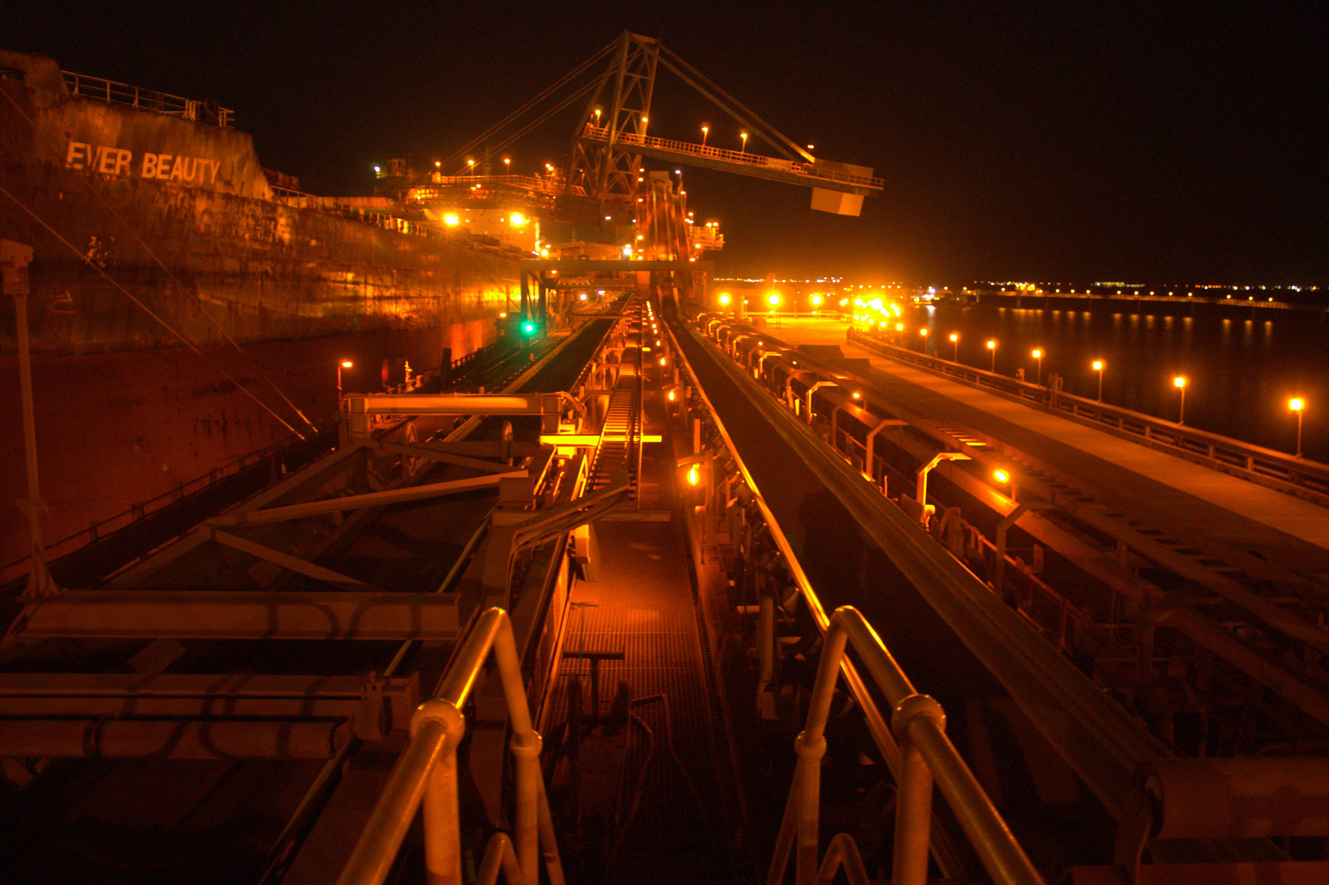 Coolon DLK2 in turtle friendly amber CRI installed on a conveyor in Coastal Pilbara. Night time photo. 