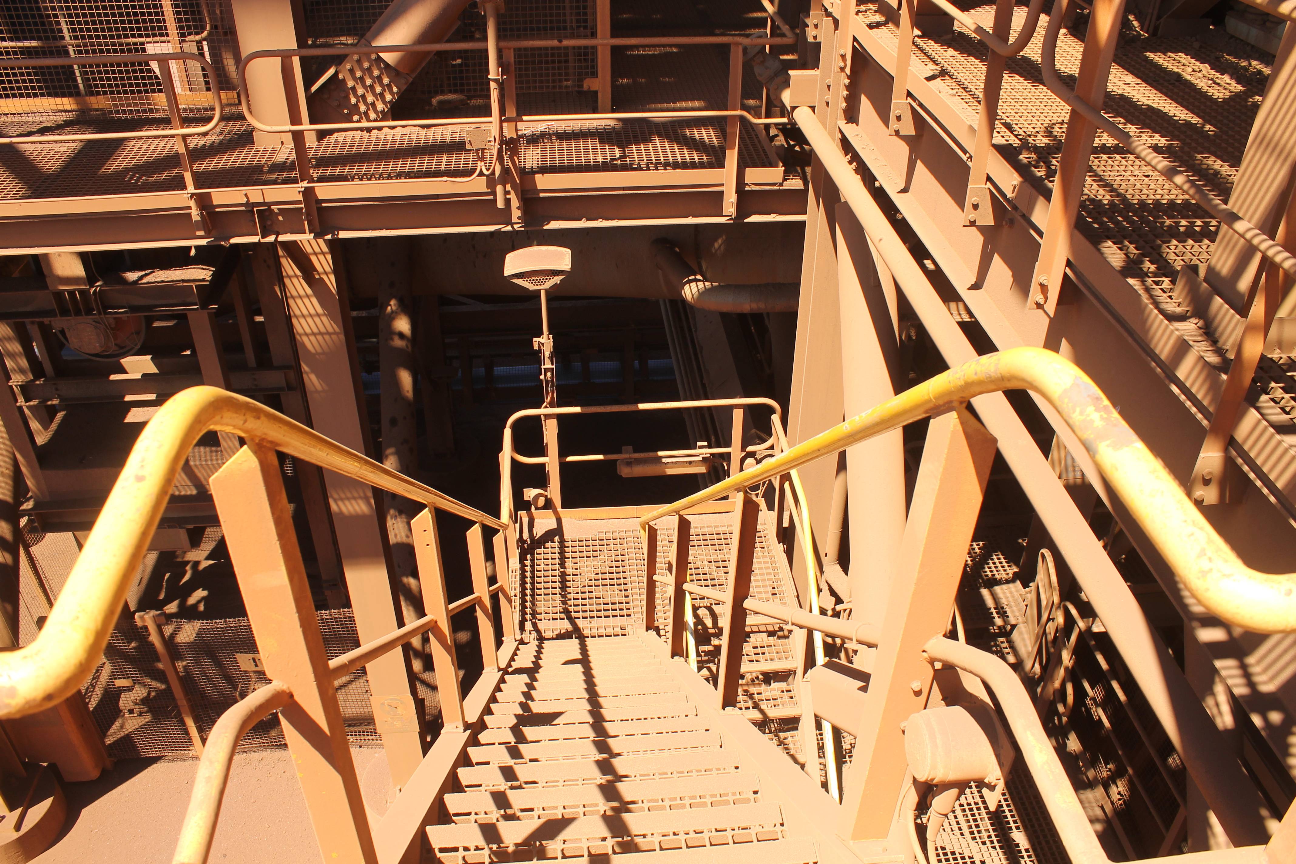 Coolon DLK2 installed on a conveyor in Coastal Pilbara. Close up on a DLK2 installed on a stairwell.