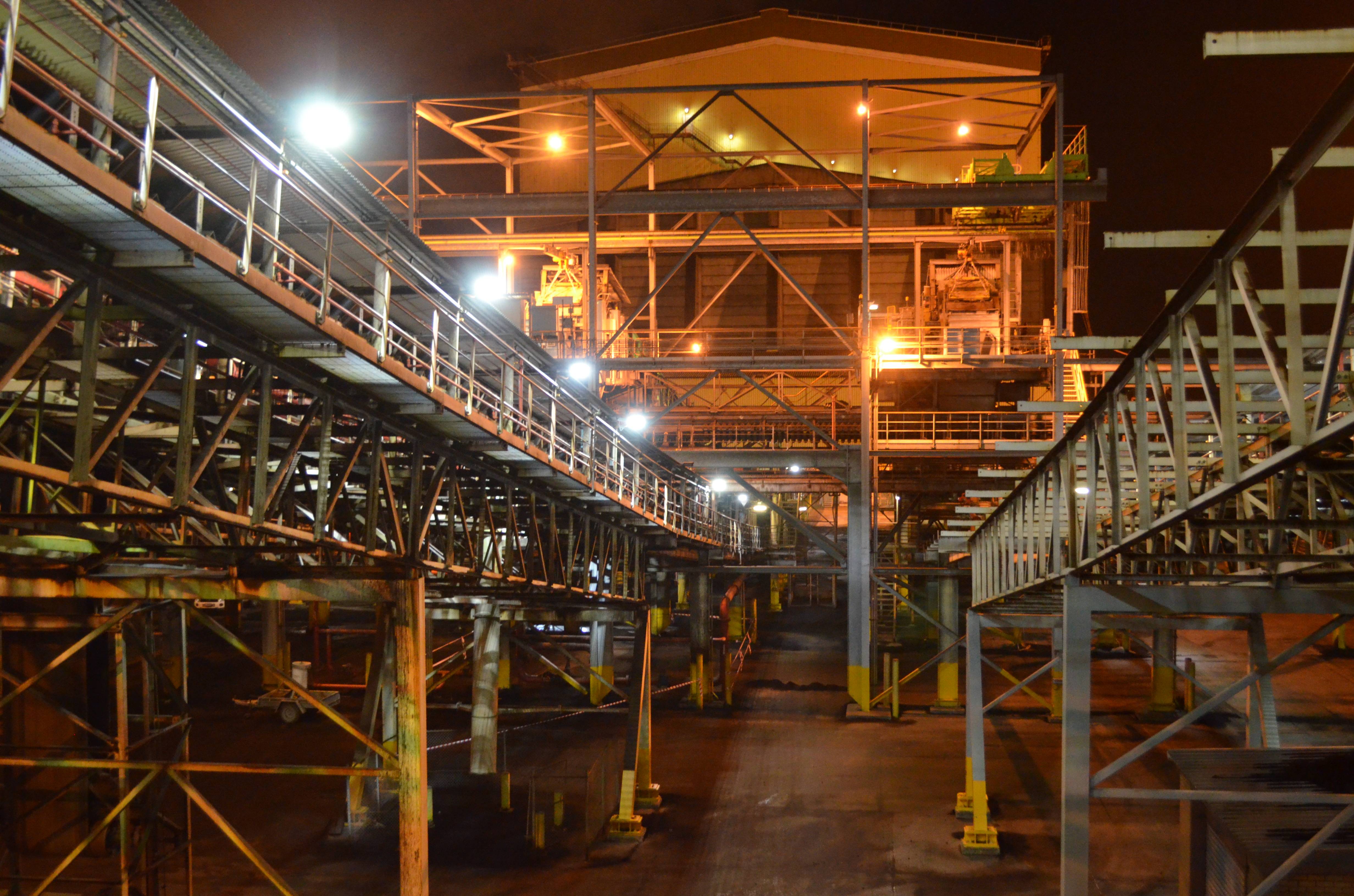 An industrial conveyor on a power plant is lit up with Coolon DLK2s.