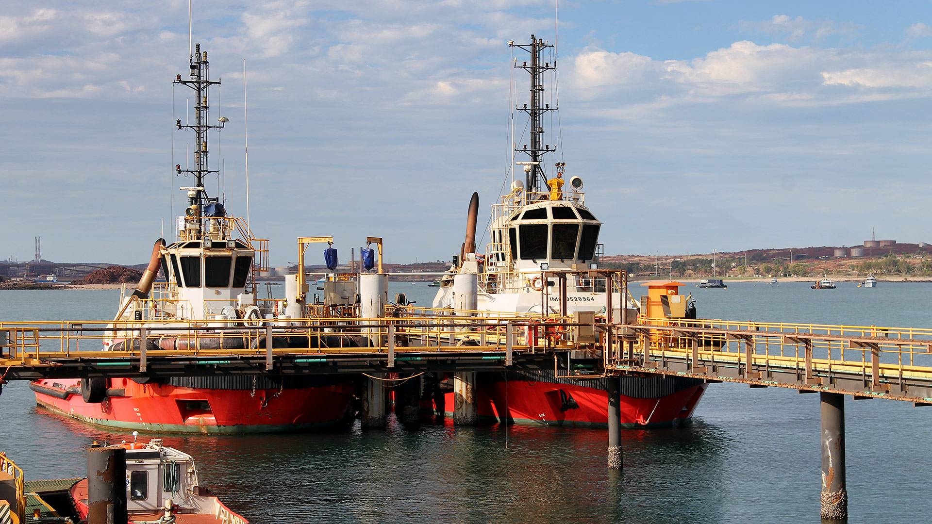 CP56 LED Flood Light in application, installed ob tug boats in a bulk port on iron ore