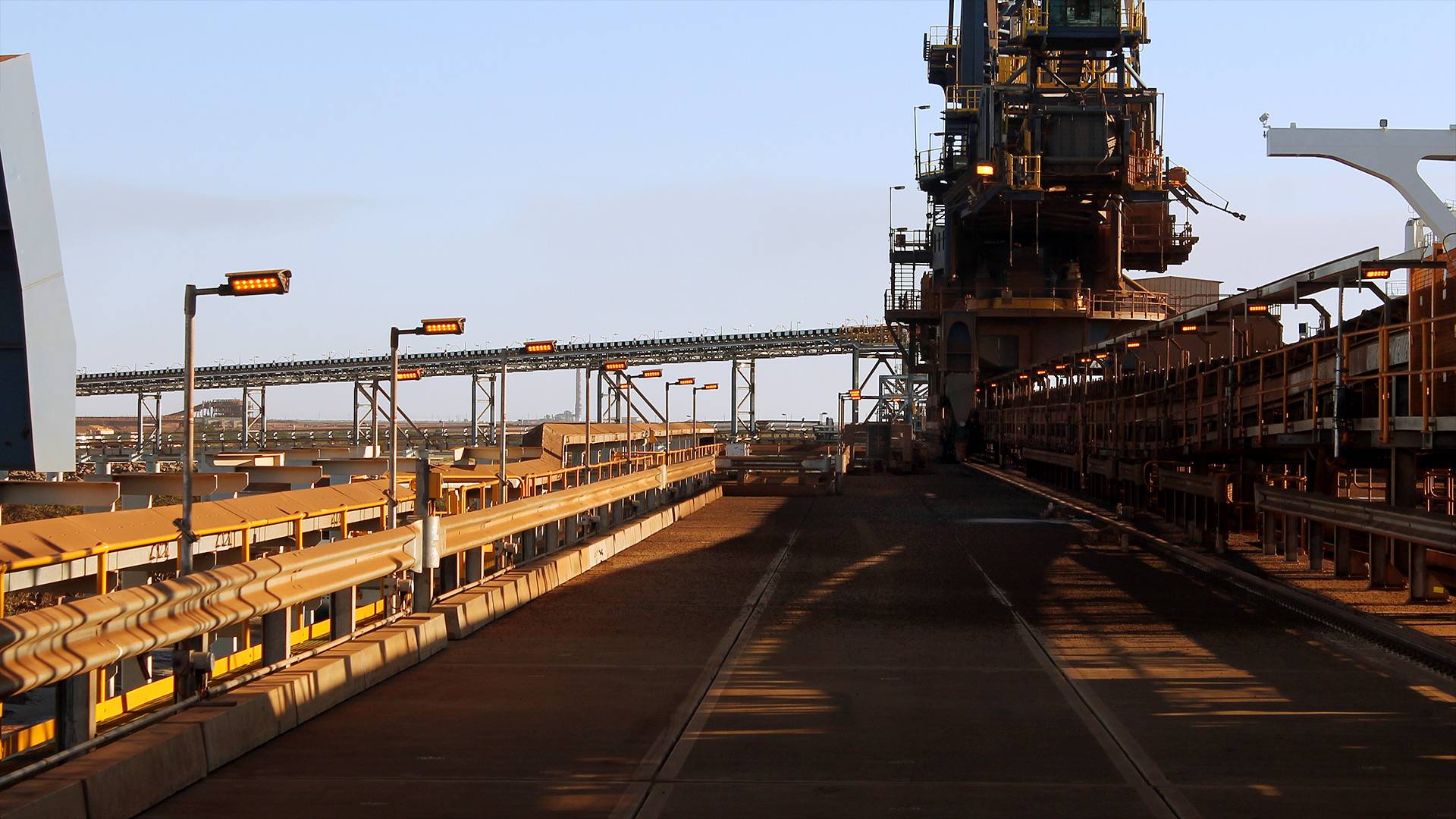 DLK LED Conveyor / Area Light in application, installed on a conveyor on an iron ore mine in bulk port