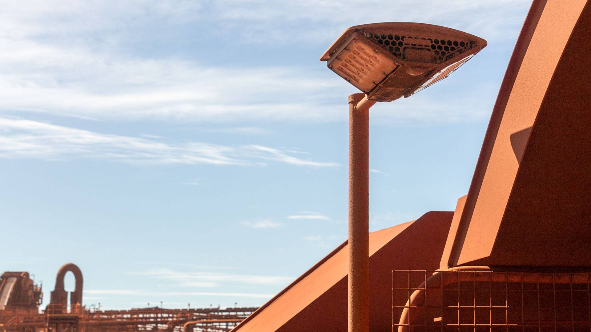 DLK LED Conveyor / Area Light in application, installed on a stacker reclaimer,  on stairwells and platforms