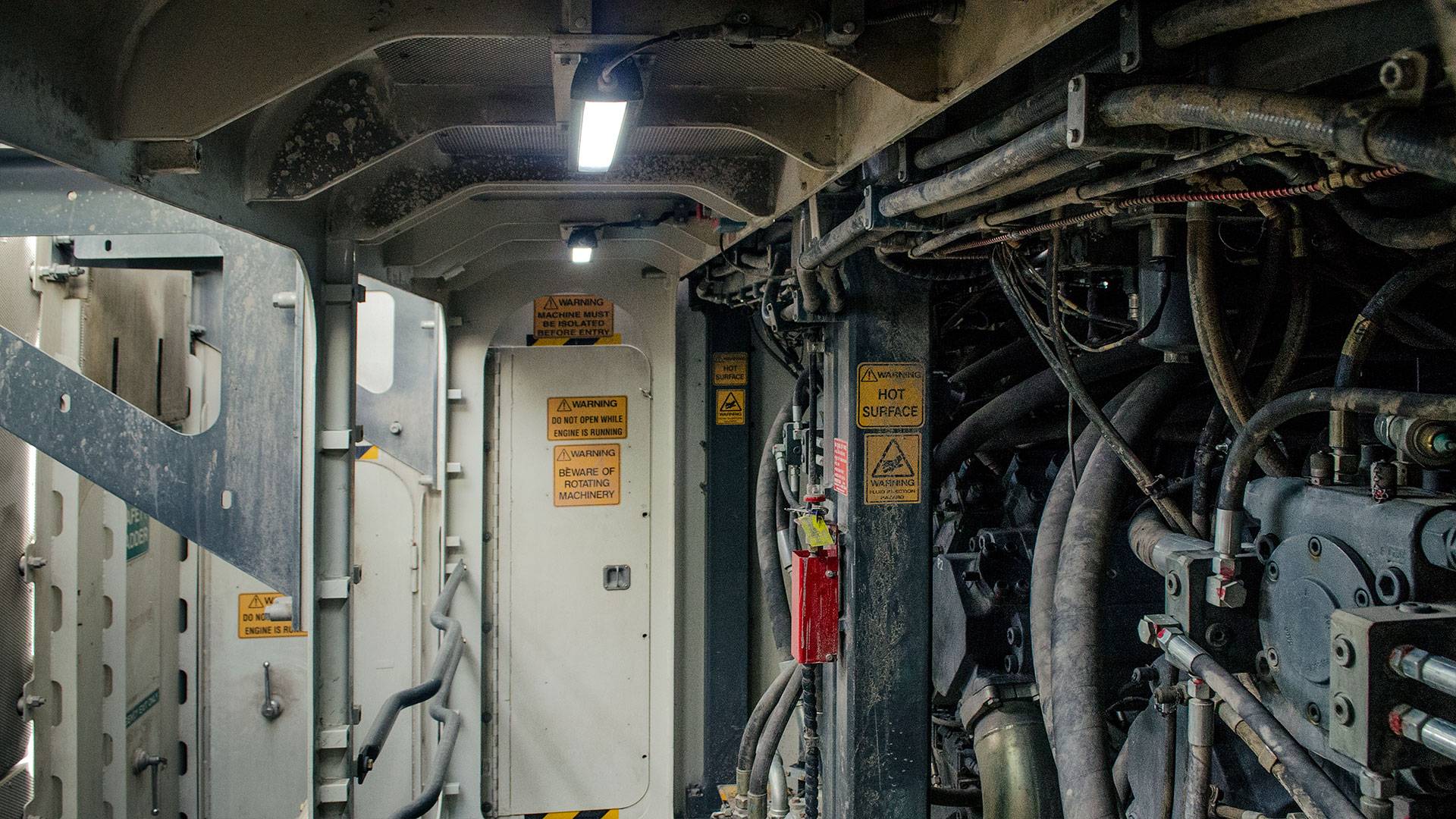 MC22 Machine Light in application, installed in the engine bay on a 996 liebherr excavator