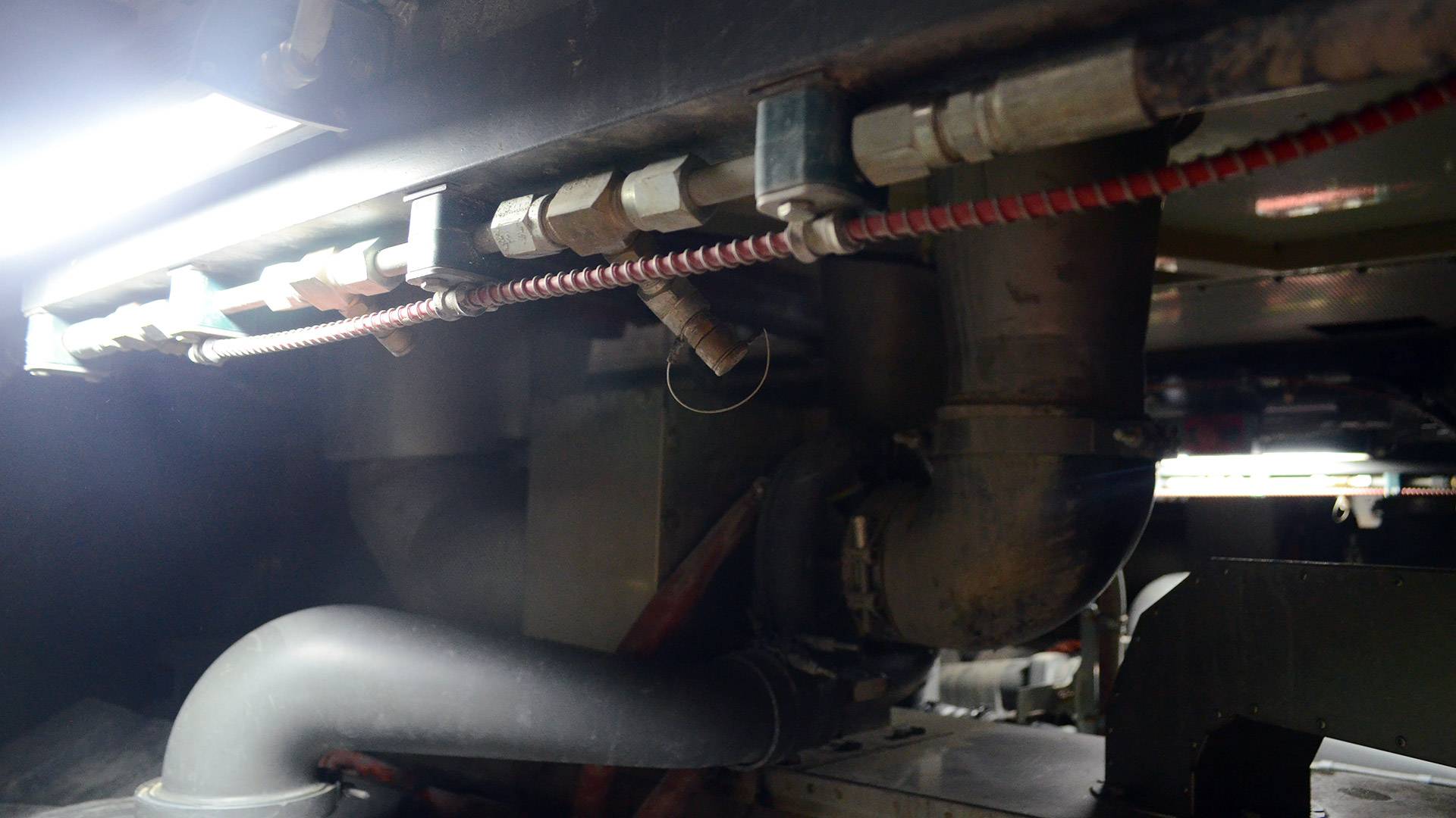 MC22 Machine Light in application, installed in the engine bay on a 996 liebherr excavator