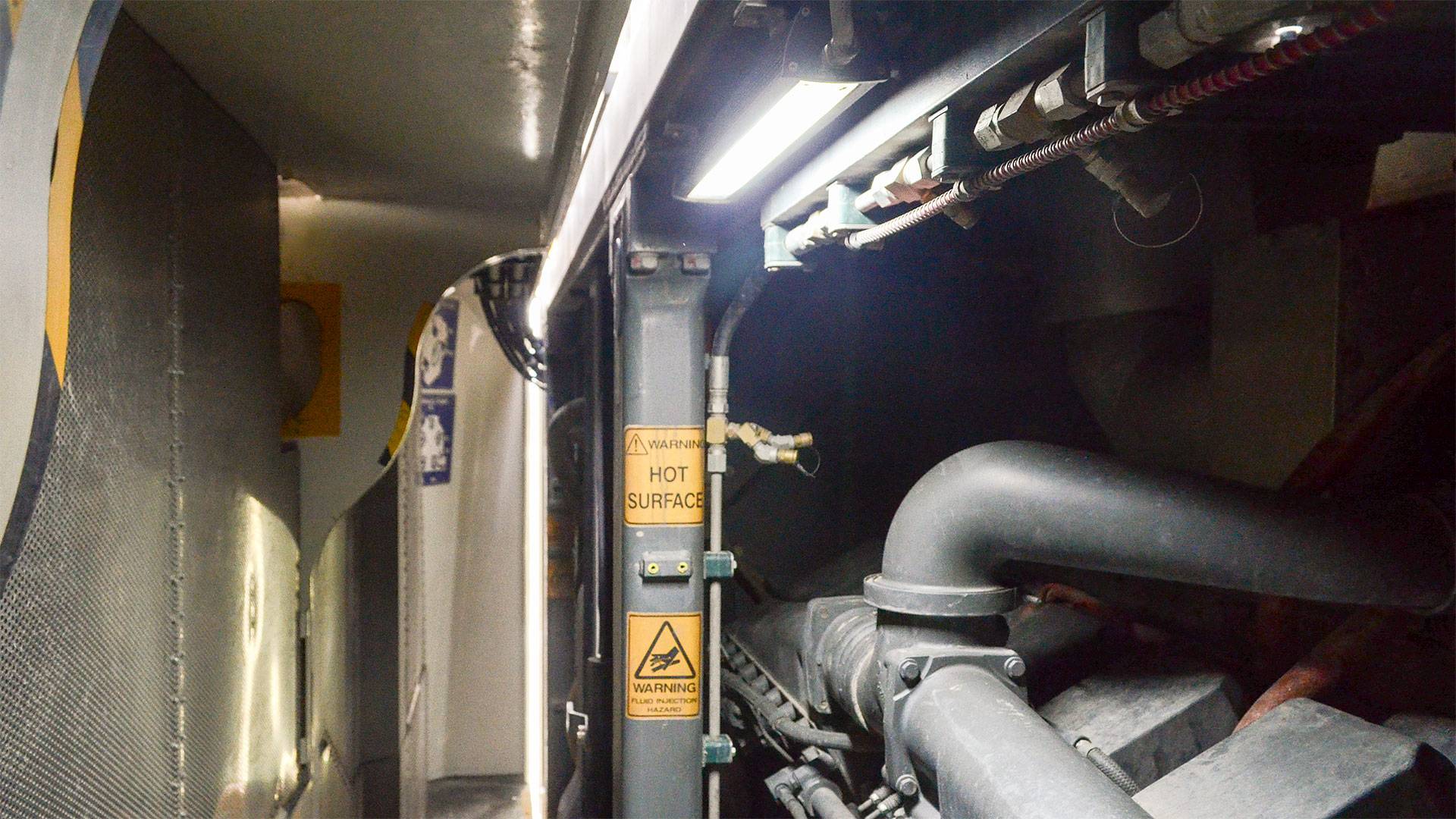 MC22 Machine Light in application, installed in the engine bay on a 996 liebherr excavator