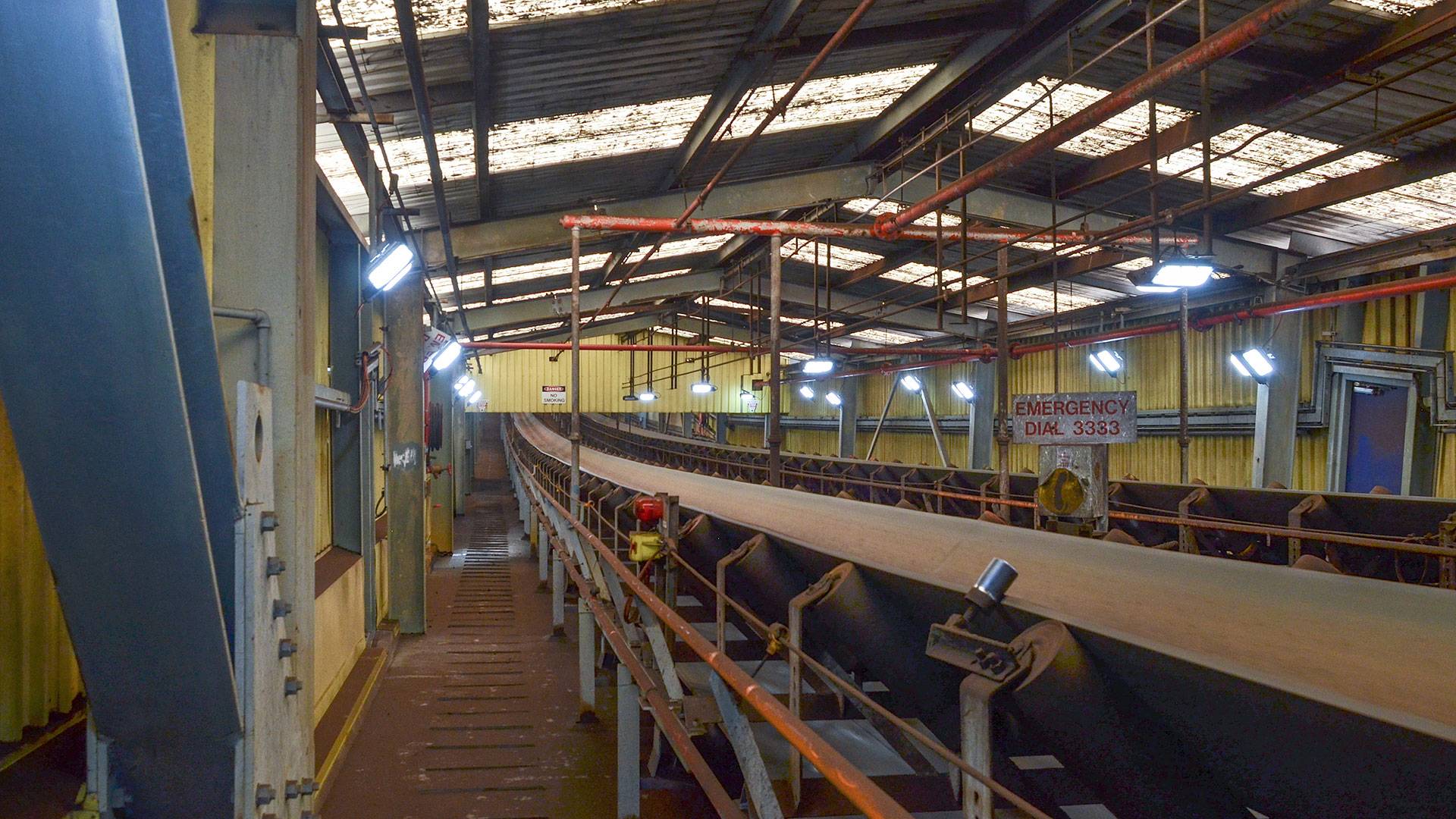 Tunnel Ray LED Tunnel / Low Profile Light in application, installed on an enclosed rising conveyor on a  coal fired power station