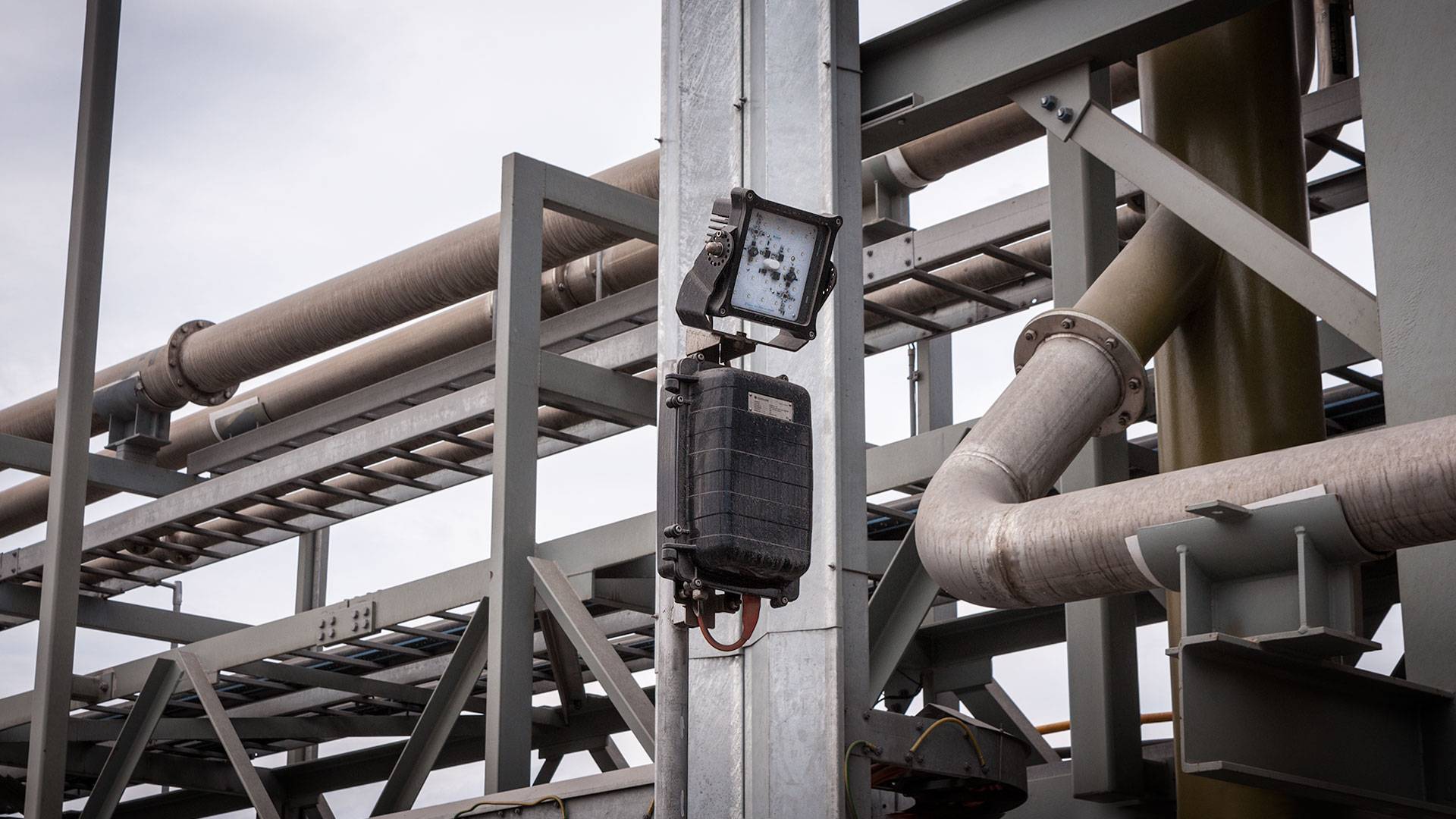Warden LED Flood Light in application,installed on a wall on an industrial / mine site